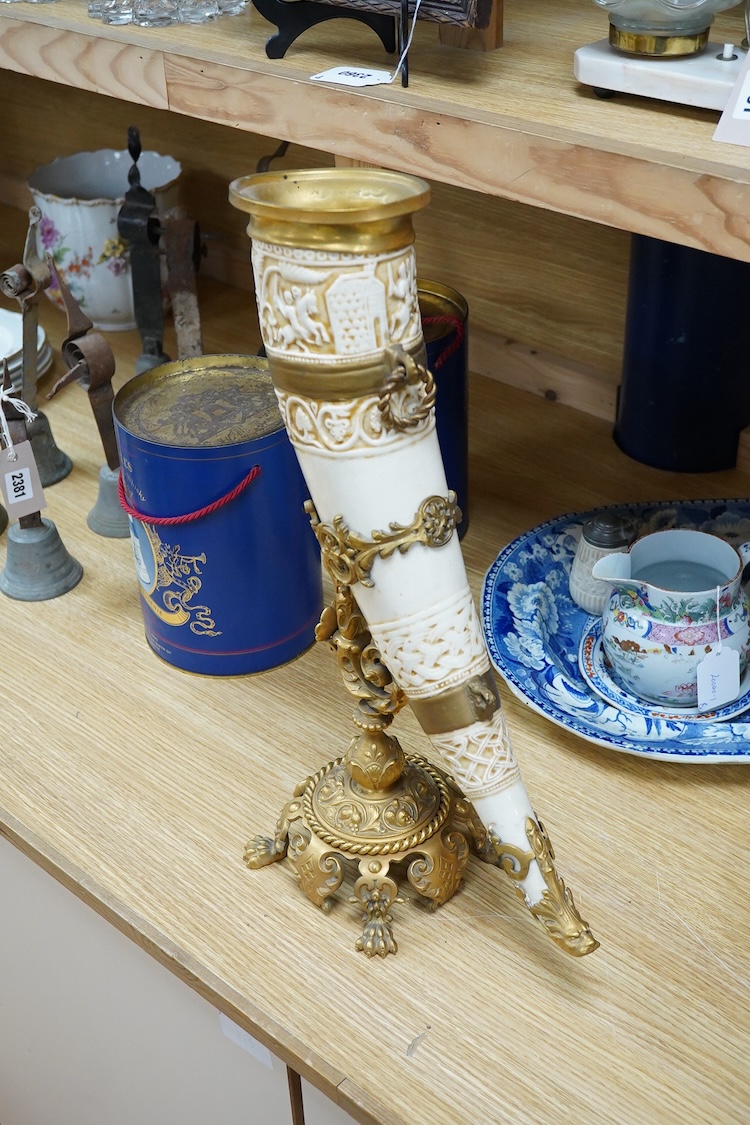 A late 19th century Viennese ormolu mounted ceramic drinking horn vase, 47cm high